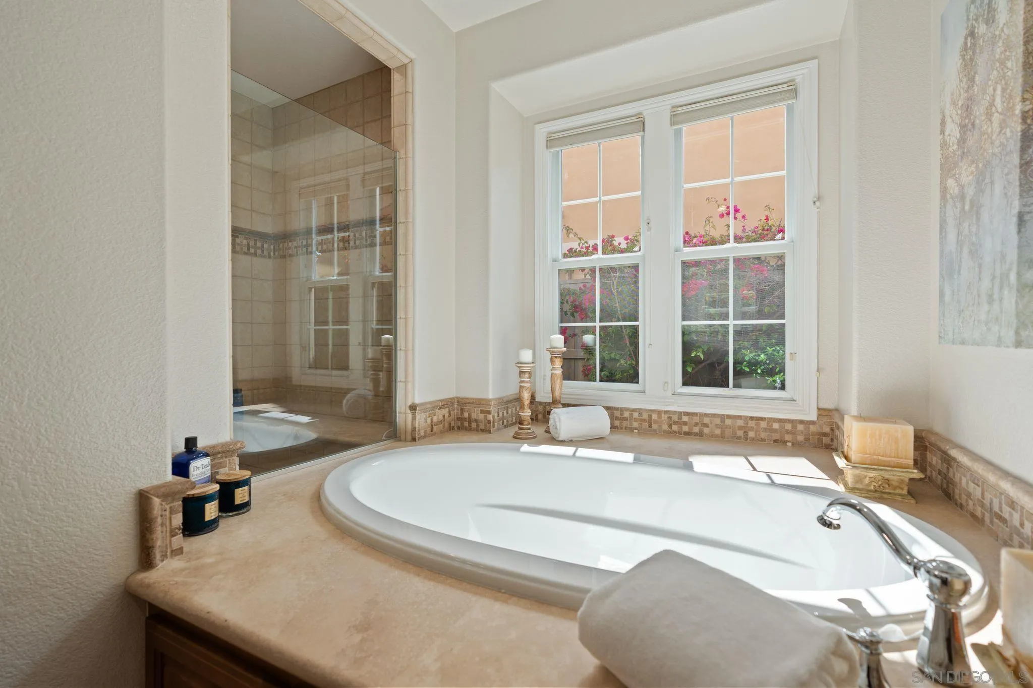 15583 Rising River Place South San Diego, CA 92127 - Photo 35 of 61 a bathroom with a tub a sink and a window