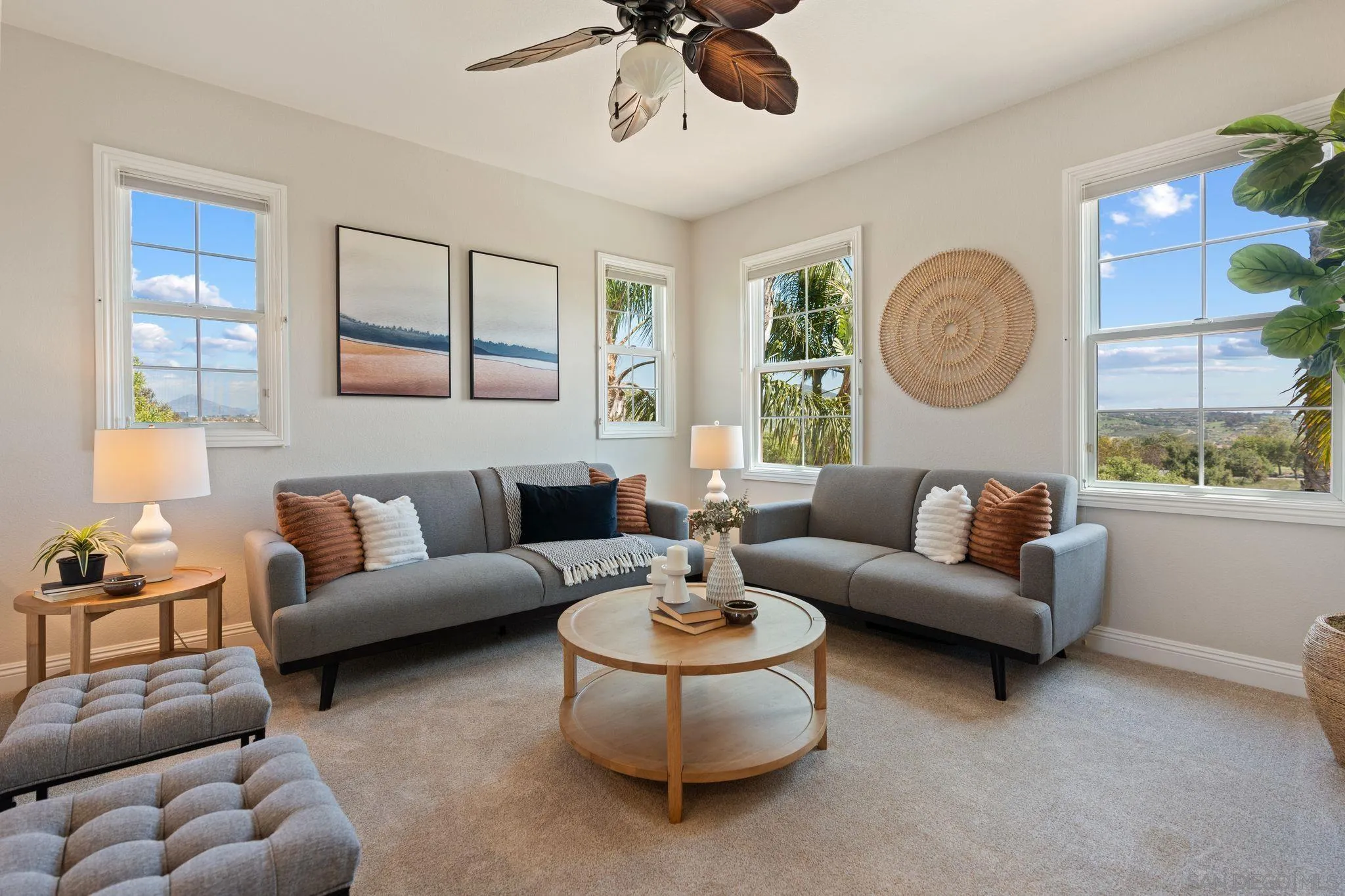 15583 Rising River Place South San Diego, CA 92127 - Photo 38 of 61 a living room with furniture and a large window