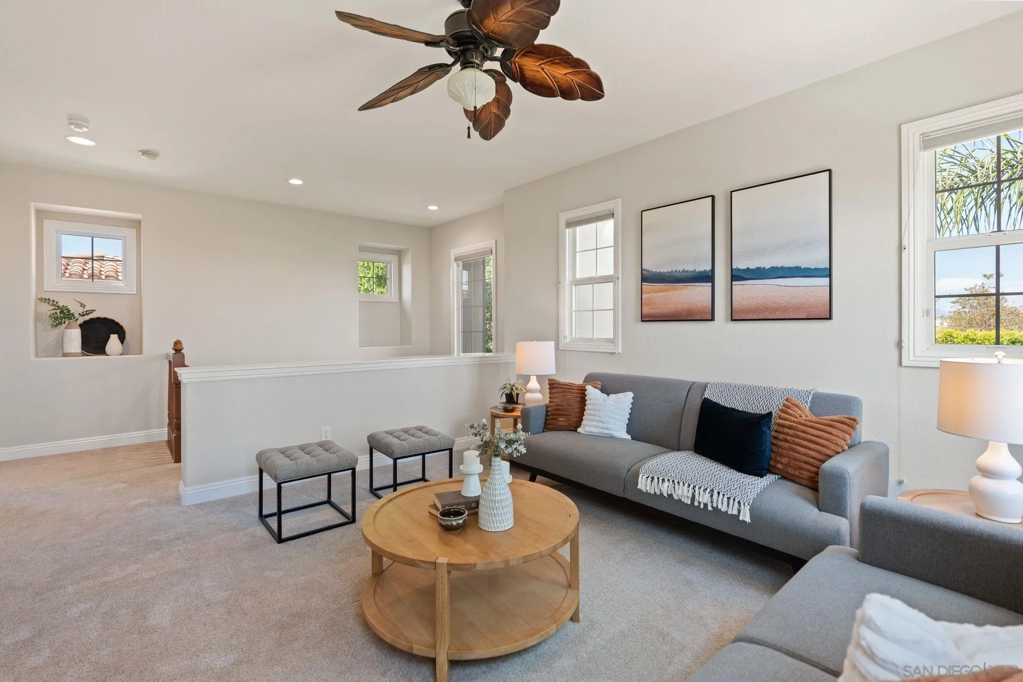 15583 Rising River Place South San Diego, CA 92127 - Photo 39 of 61 a living room with furniture and a large window