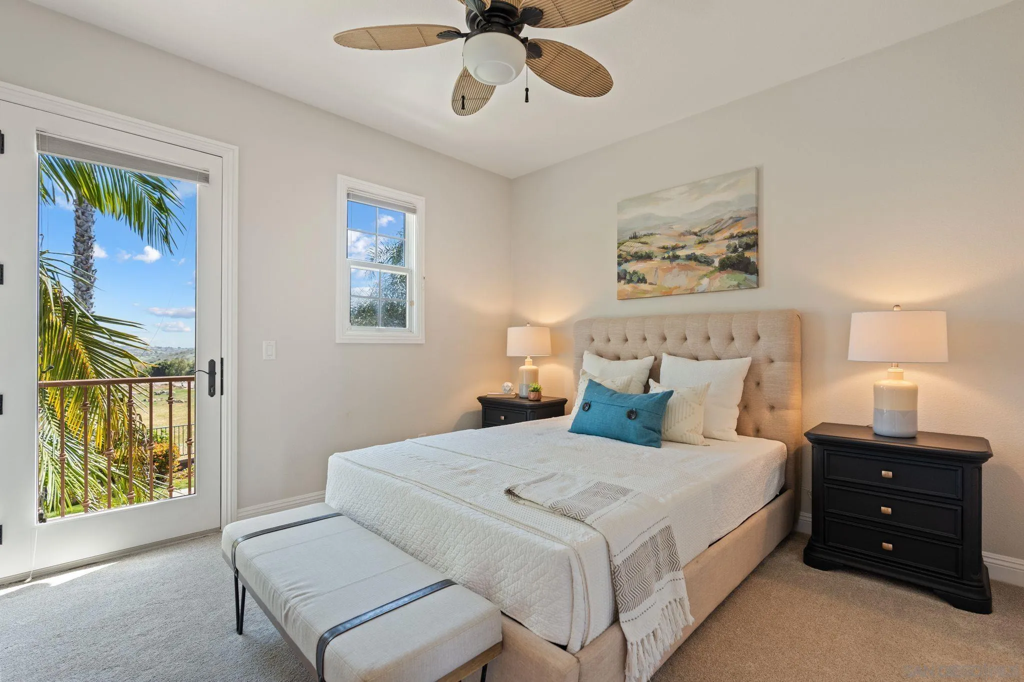 15583 Rising River Place South San Diego, CA 92127 - Photo 43 of 61 a bedroom with a bed and a window