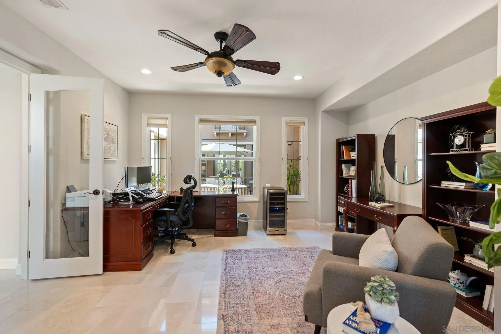 15583 Rising River Place South San Diego, CA 92127 - Photo 5 of 61 a living room with furniture and a flat screen tv