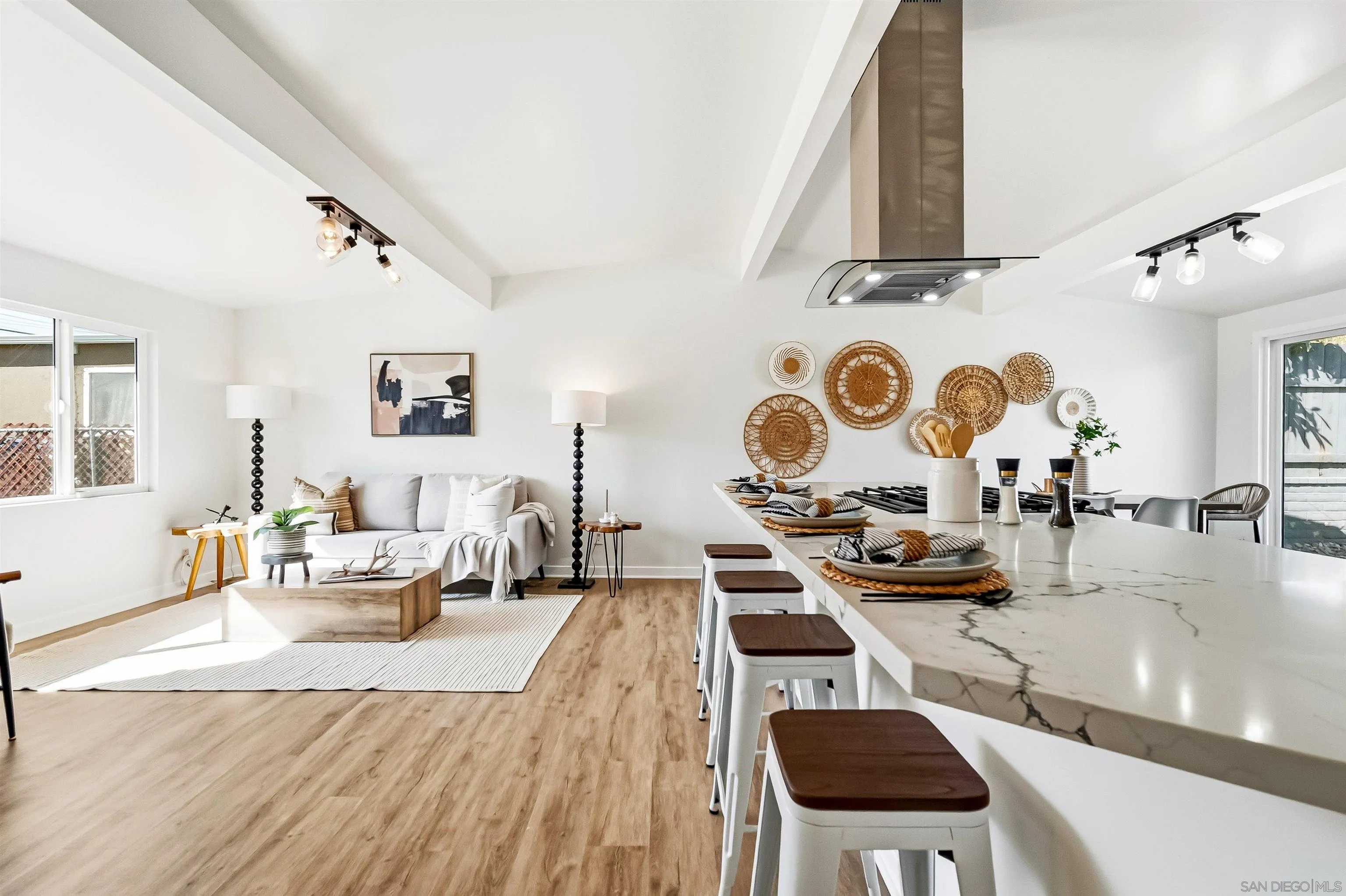 9844 Arapaho Street Spring Valley, CA 91977 - Photo 11 of 29 a living room with furniture and wooden floor
