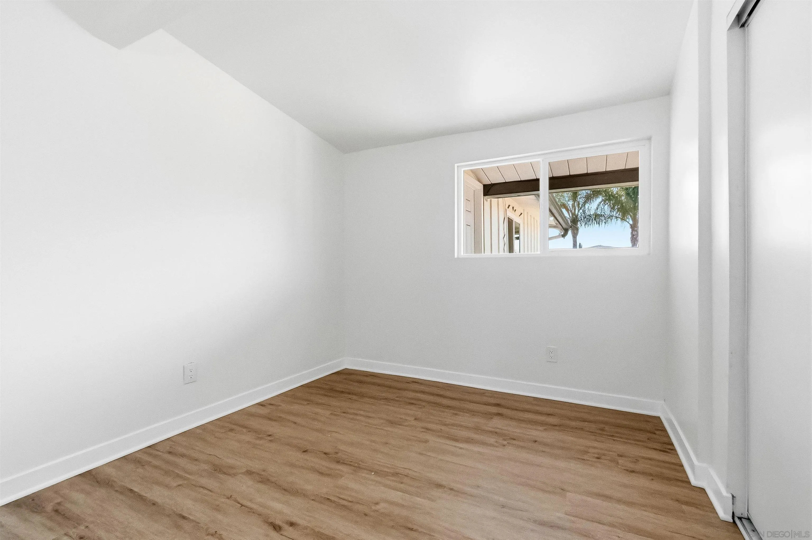 9844 Arapaho Street Spring Valley, CA 91977 - Photo 15 of 29 wooden floor in an empty room