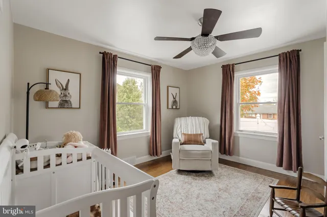 a bedroom with furniture and window
