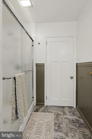 a utility room with sink dryer and washer