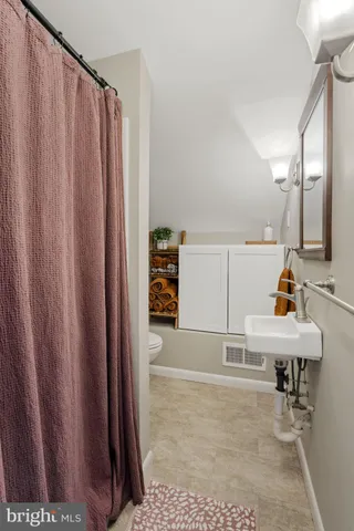 a view of storage and utility room