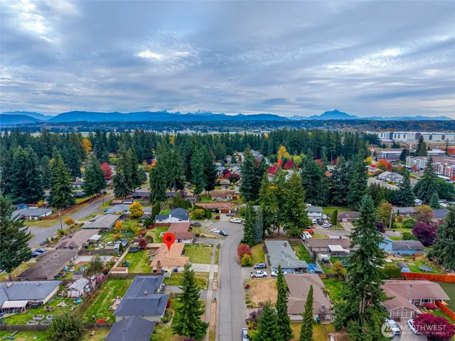 a view of a swimming pool with an outdoor seating