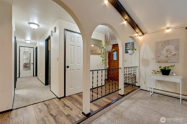 a view of entryway with livingroom