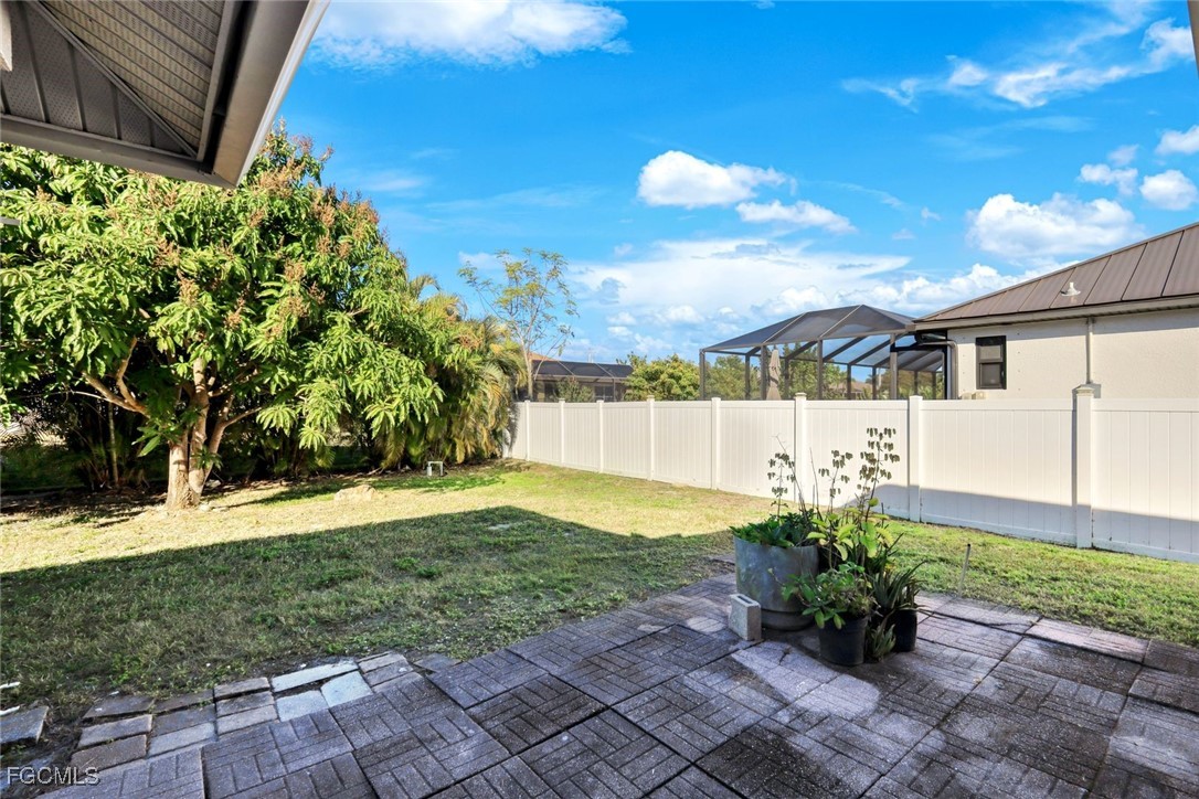 2519 Southwest 30th Street Cape Coral, FL 33914 - Photo 22 of 23 a view of a backyard with garden