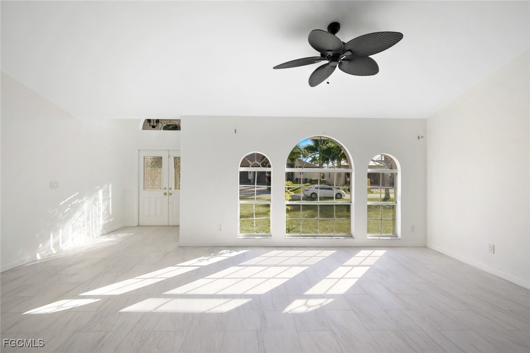 2519 Southwest 30th Street Cape Coral, FL 33914 - Photo 3 of 23 a view of empty room with ceiling fan