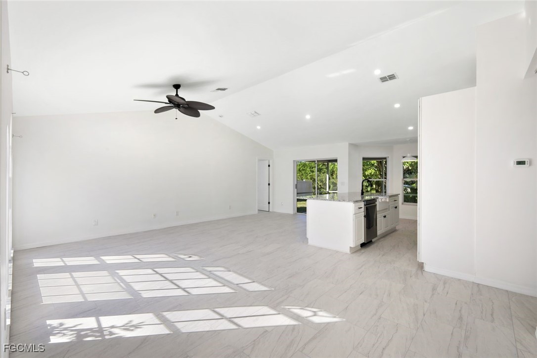 2519 Southwest 30th Street Cape Coral, FL 33914 - Photo 4 of 23 a view of workspace with a window and a ceiling fan