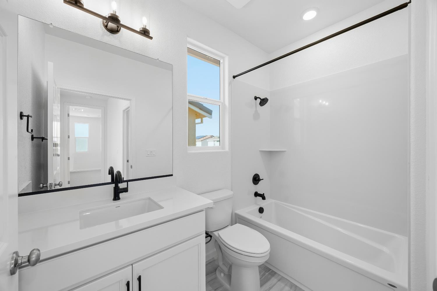 4401 Canyon Coral Way Rancho Cordova, CA 95742 - Photo 14 of 23 a bathroom with a sink a toilet and shower