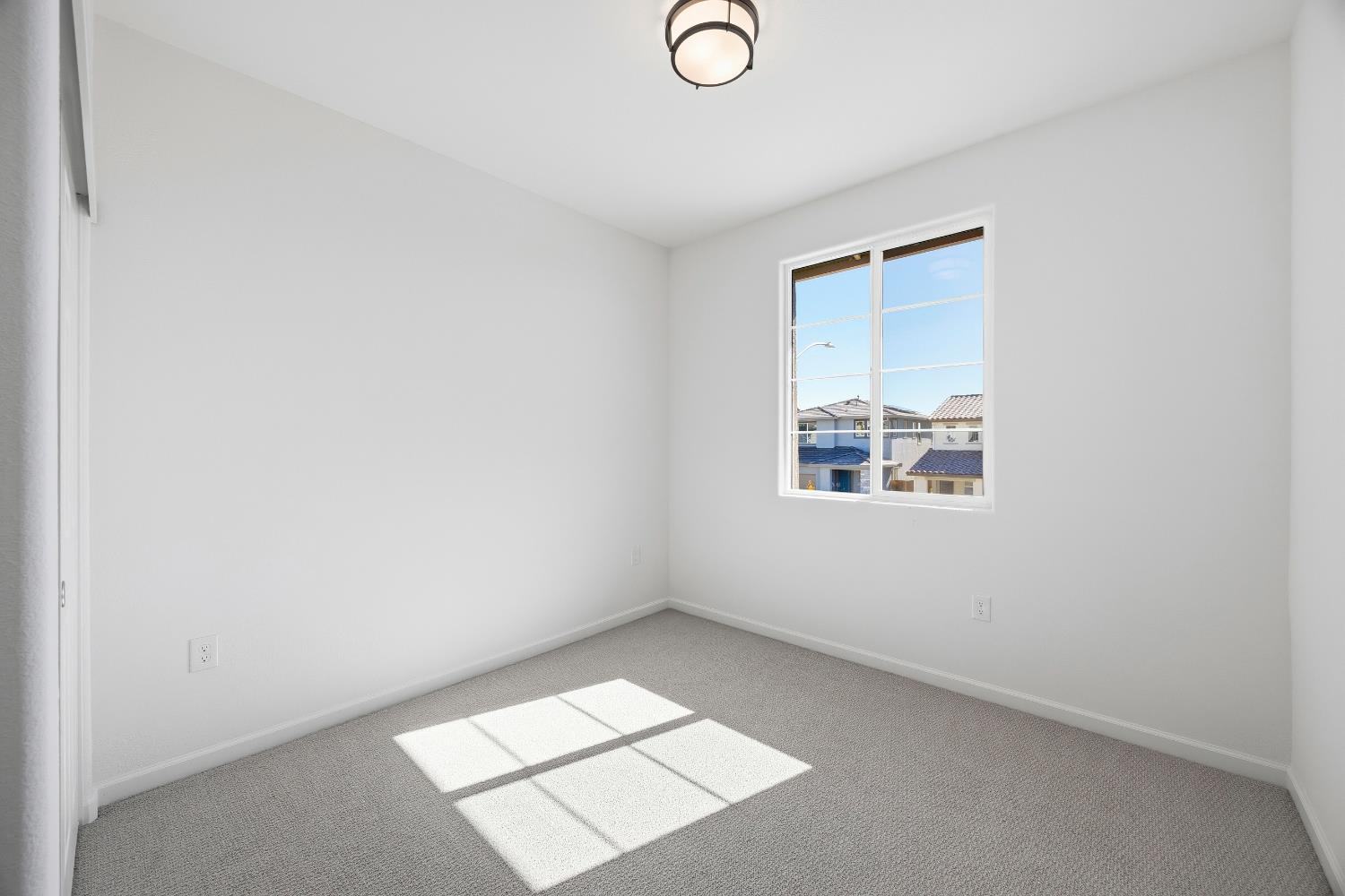 4401 Canyon Coral Way Rancho Cordova, CA 95742 - Photo 17 of 23 an empty room with a window