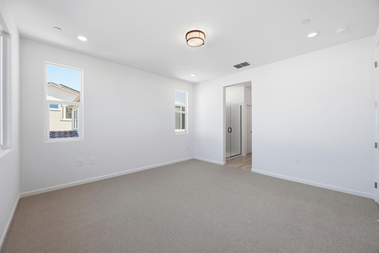 4401 Canyon Coral Way Rancho Cordova, CA 95742 - Photo 19 of 23 an empty room with windows and closet