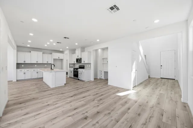 a view of kitchen with wooden floor