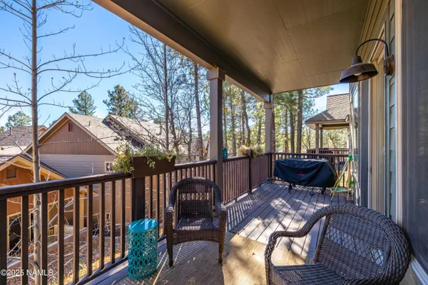 a view of balcony with furniture