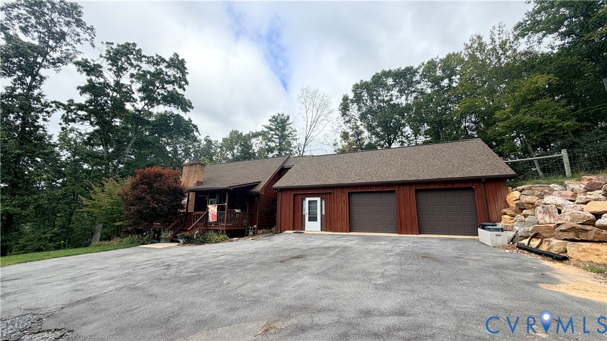 65 Cubbley Road Hot Springs, VA 24445 - Photo 11 of 50 Property exterior featuring wood siding, an attach