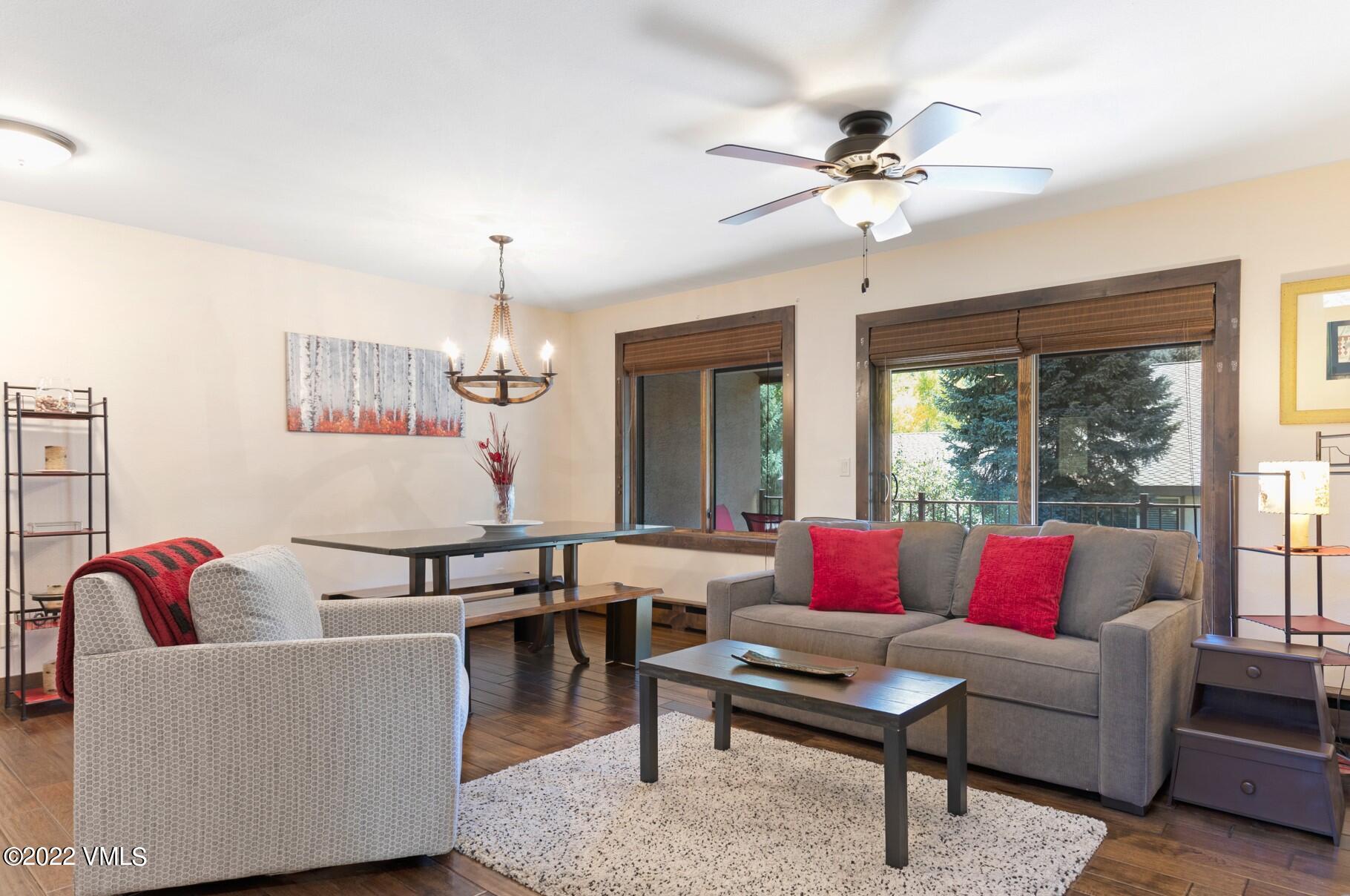 132 Eagle Road, Unit B Avon, CO 81620 - Photo 1 of 38 a living room with furniture and a large window