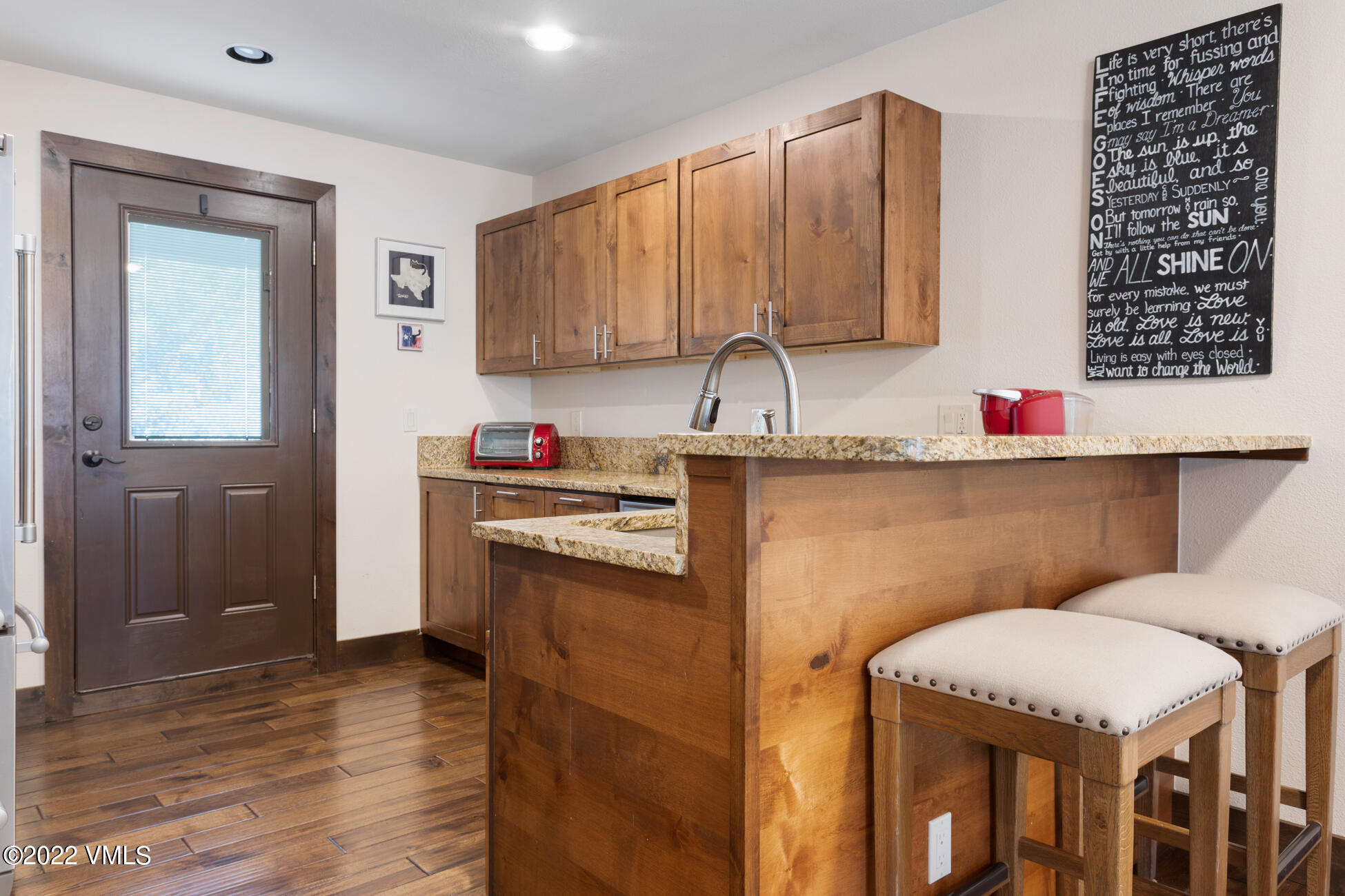 132 Eagle Road, Unit B Avon, CO 81620 - Photo 13 of 38 a kitchen that has a sink and a stove in it