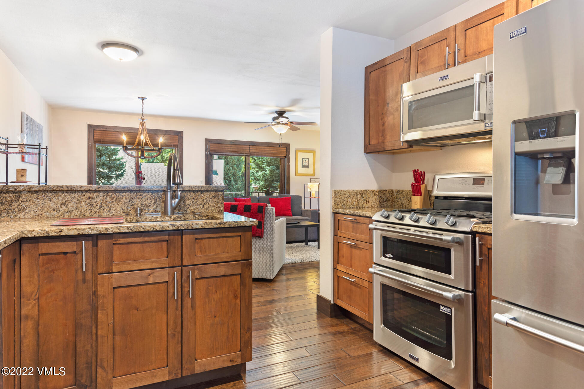 132 Eagle Road, Unit B Avon, CO 81620 - Photo 16 of 38 a kitchen with a stove and a sink