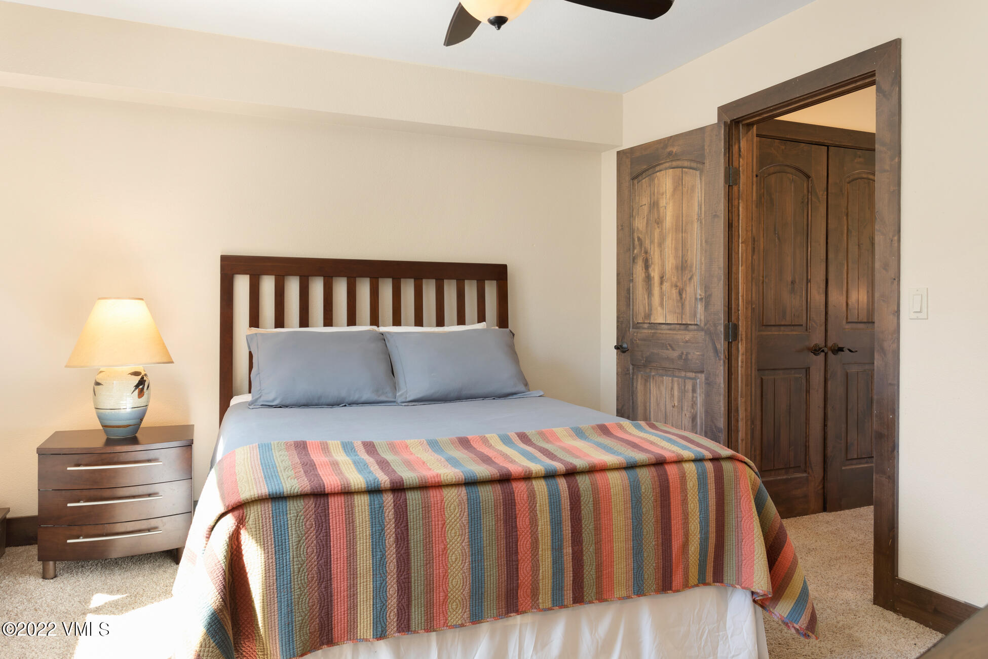 132 Eagle Road, Unit B Avon, CO 81620 - Photo 17 of 38 a bedroom with a bed and a window
