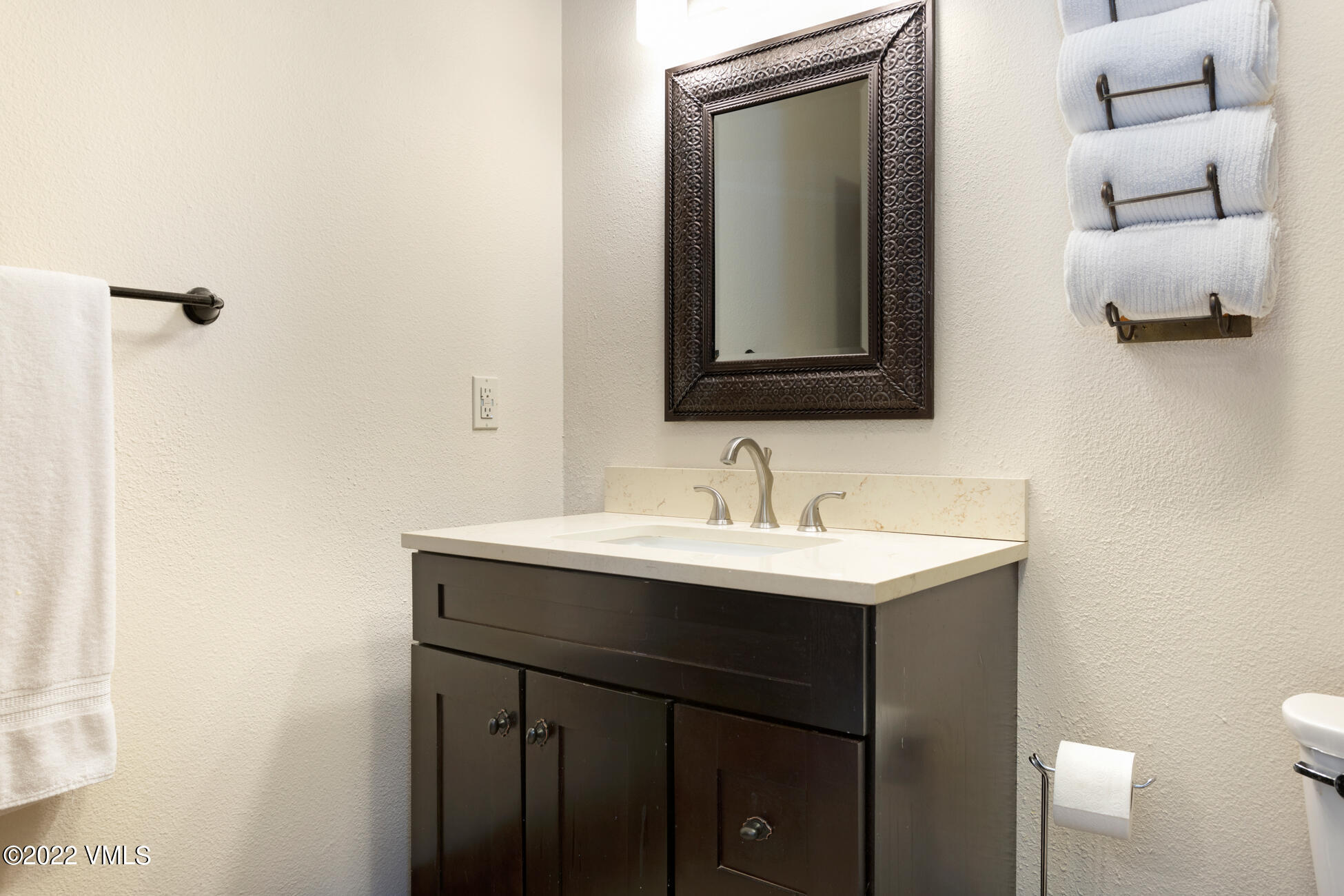 132 Eagle Road, Unit B Avon, CO 81620 - Photo 21 of 38 a bathroom with a sink and a toilet