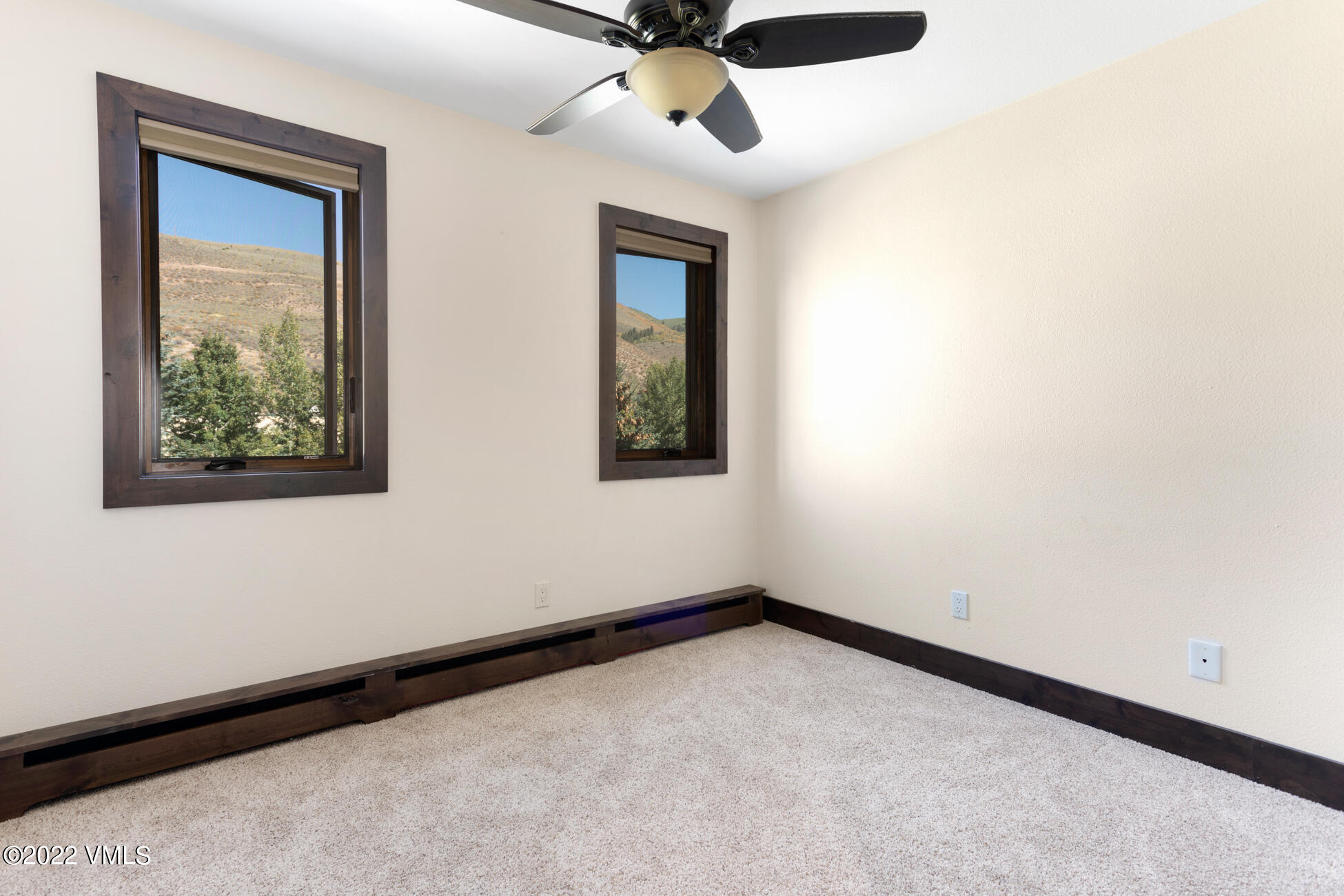 132 Eagle Road, Unit B Avon, CO 81620 - Photo 23 of 38 a view of an empty room with a window