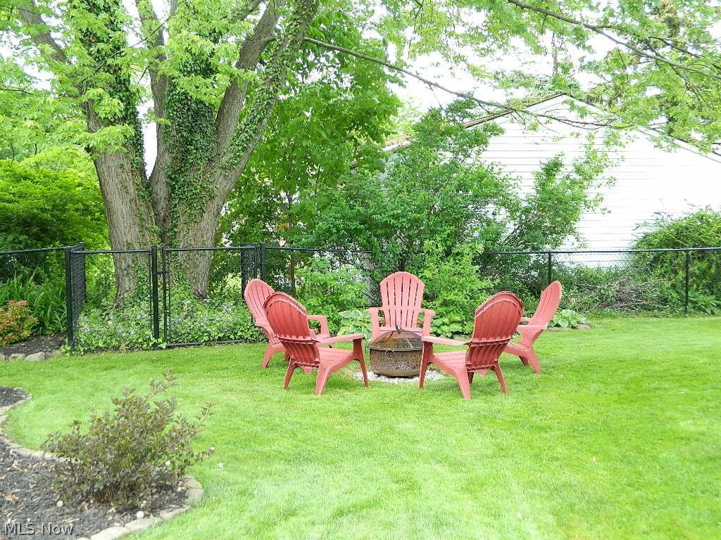 1604 Lyndhurst Road Lyndhurst, OH 44124 - Photo 31 of 35 Close Up View of Fire Pit Area That Will Remain with the Home. That Large Tree in the Back Belongs with This Property!