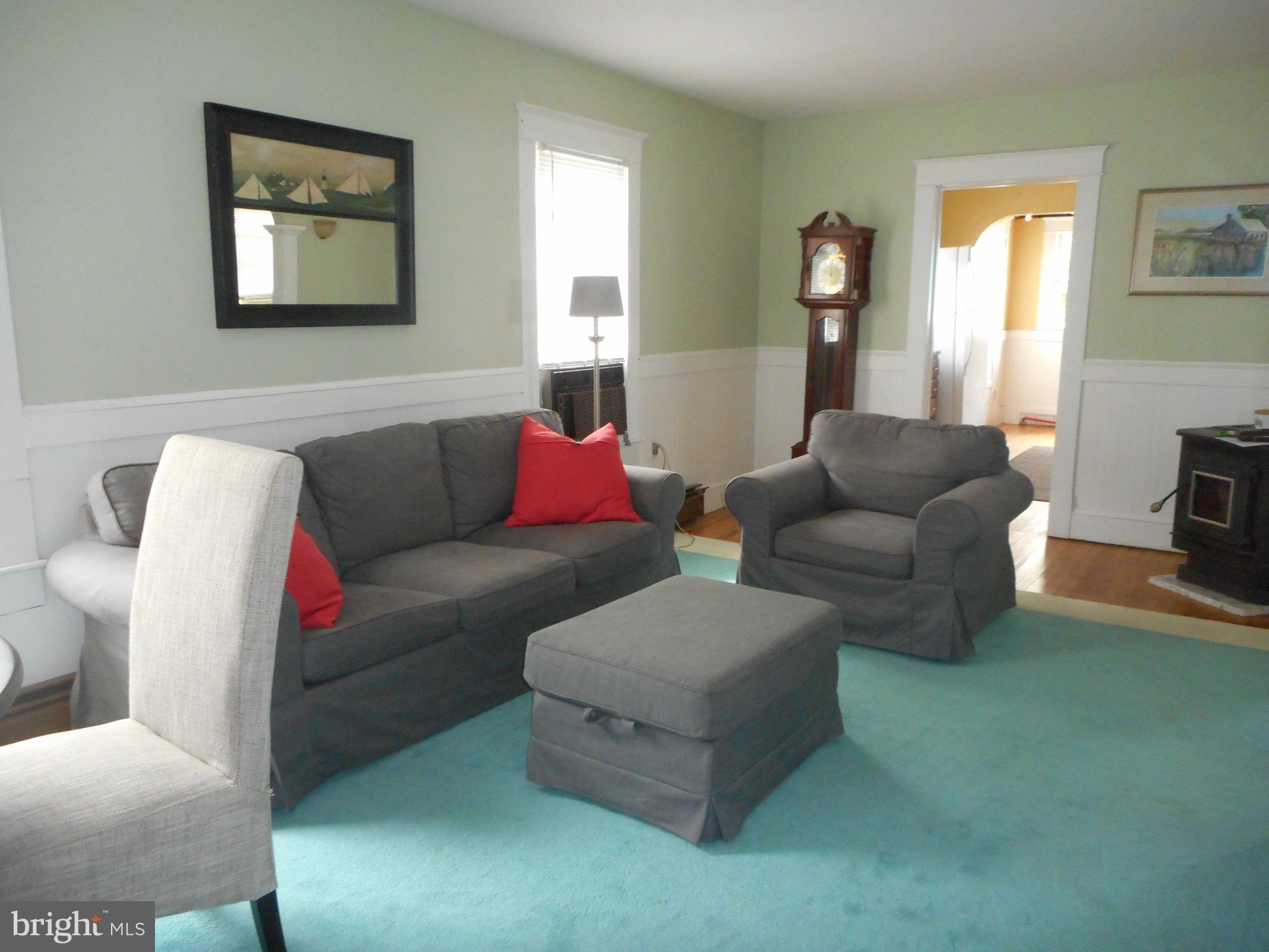 105 Hiawatha Road Cambridge, MD 21613 - Photo 3 of 15 a living room with furniture and a couch
