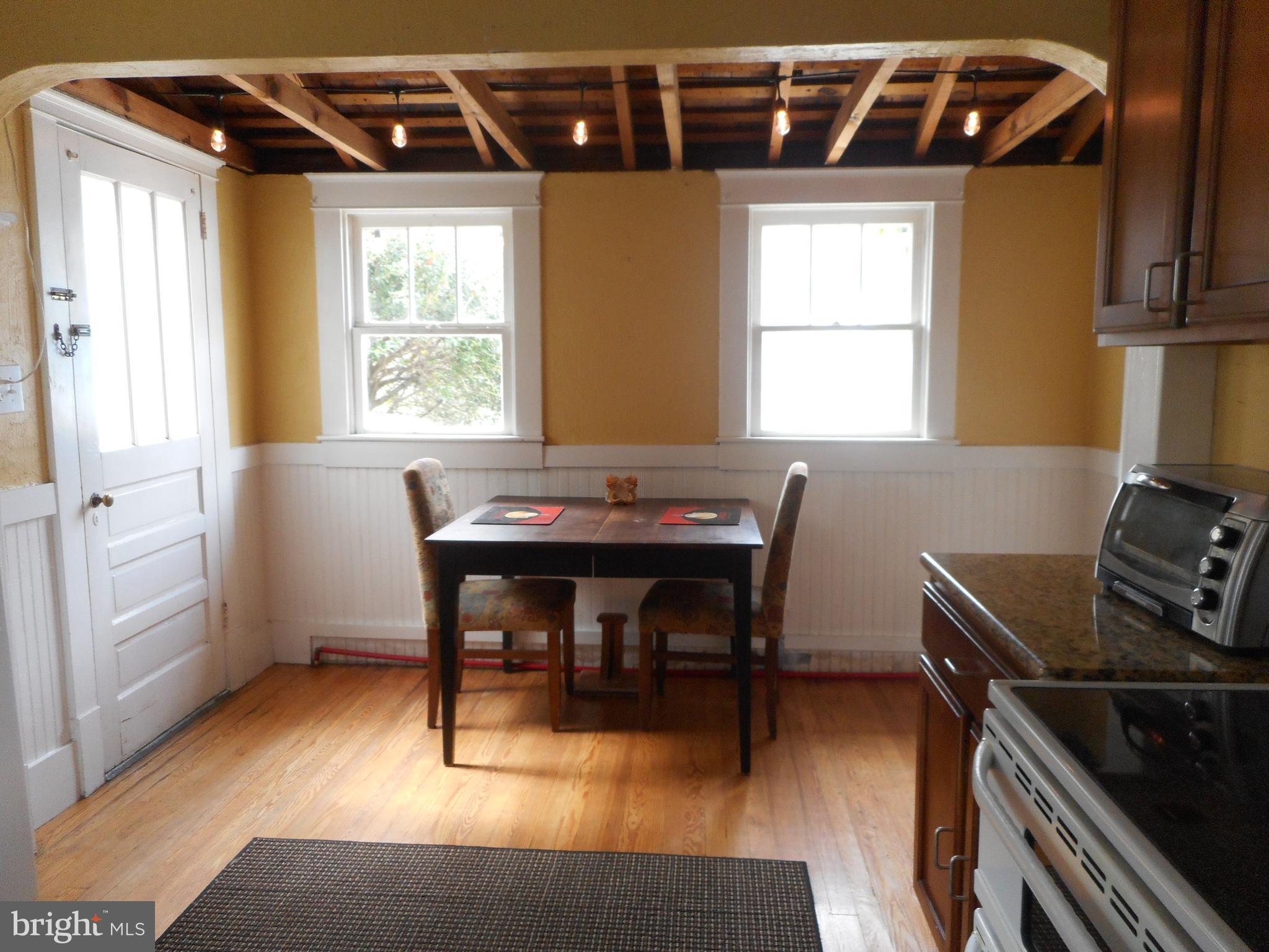105 Hiawatha Road Cambridge, MD 21613 - Photo 6 of 15 a view of a workspace with furniture and a window