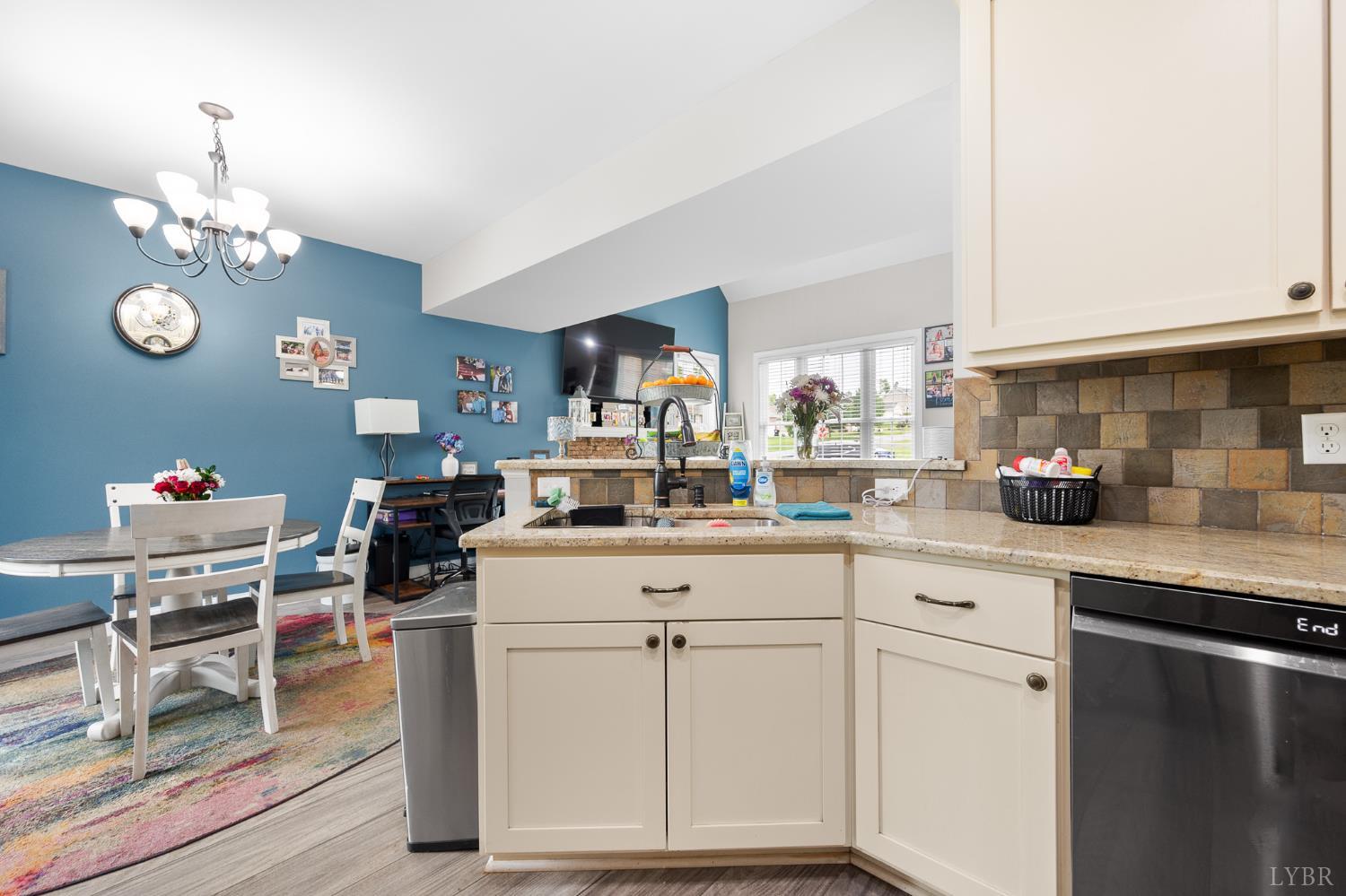 314 Cooper Way Evington, VA 24550 - Photo 13 of 44 a kitchen with white cabinets and sink