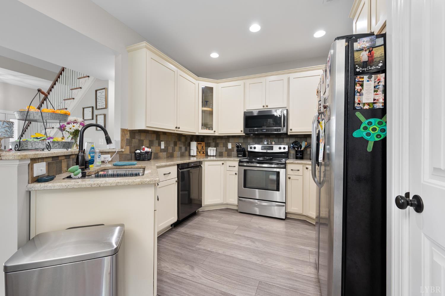314 Cooper Way Evington, VA 24550 - Photo 16 of 44 a kitchen with appliances a sink and cabinets