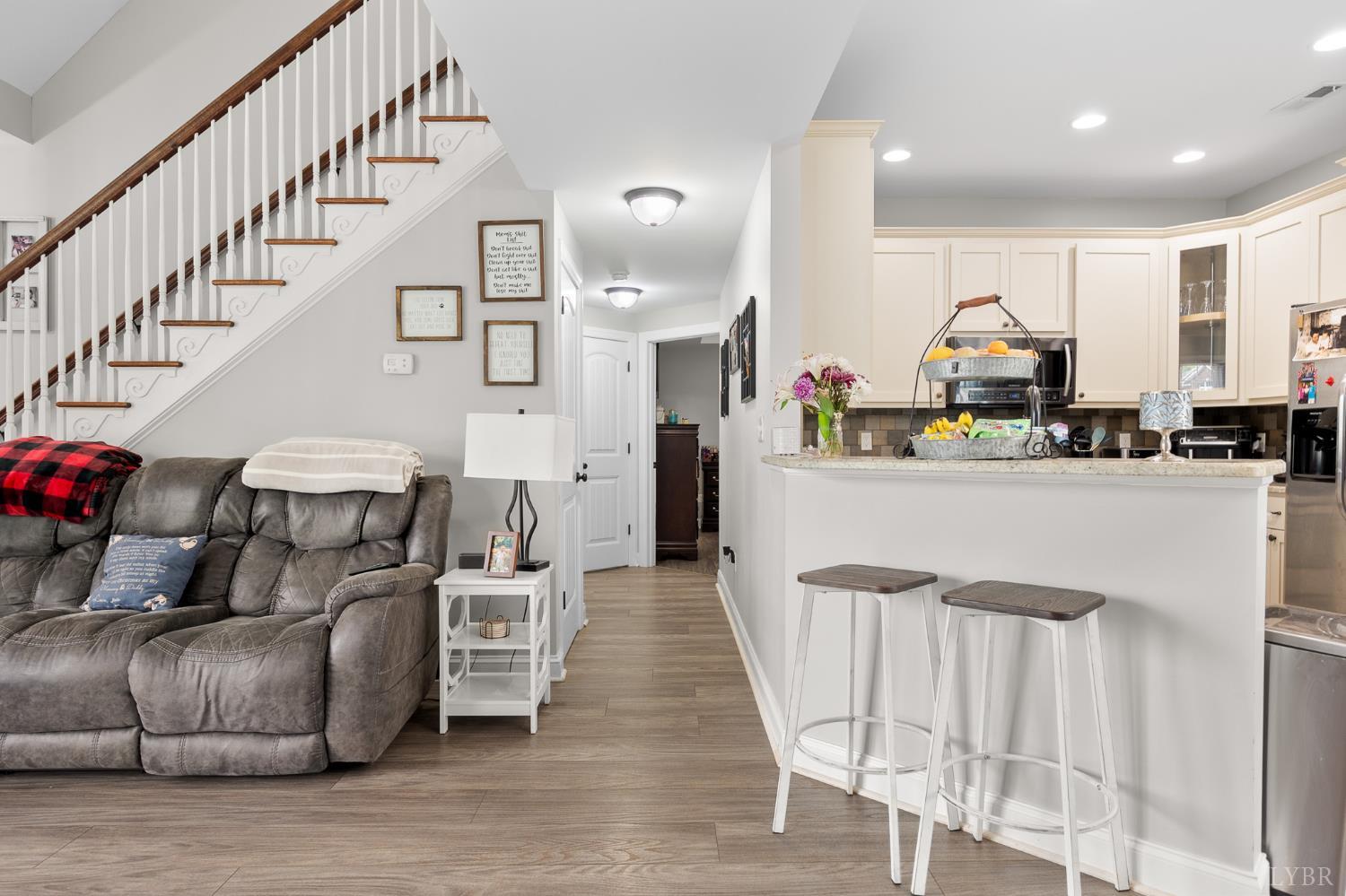 314 Cooper Way Evington, VA 24550 - Photo 18 of 44 a living room with furniture and a wooden floor