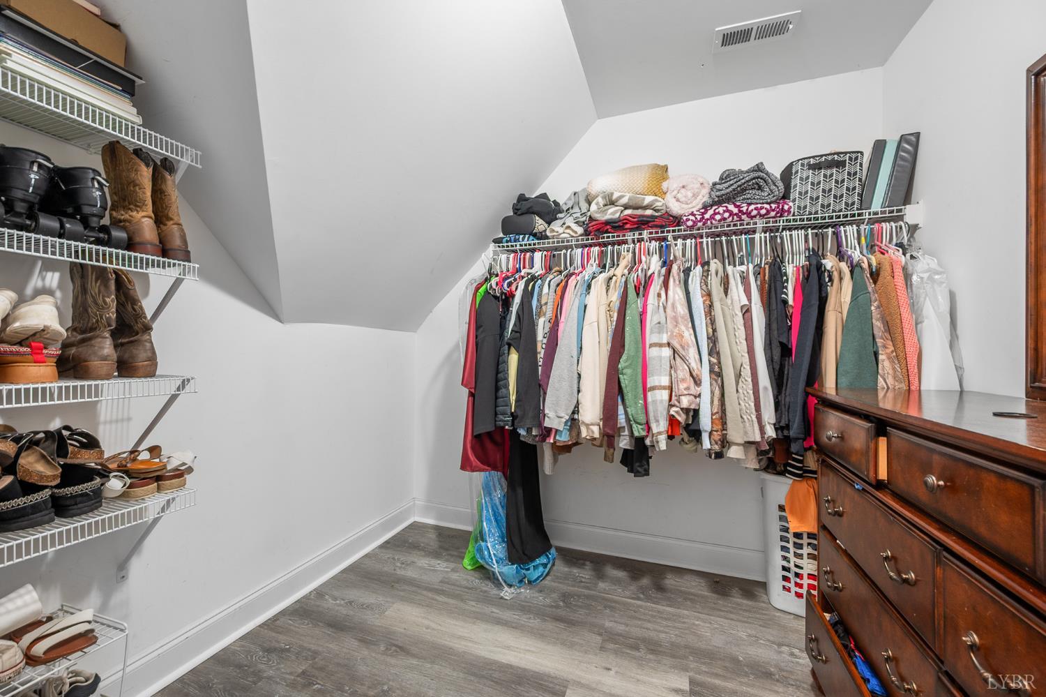 314 Cooper Way Evington, VA 24550 - Photo 25 of 44 a view of walk in closet with clothes and shoes