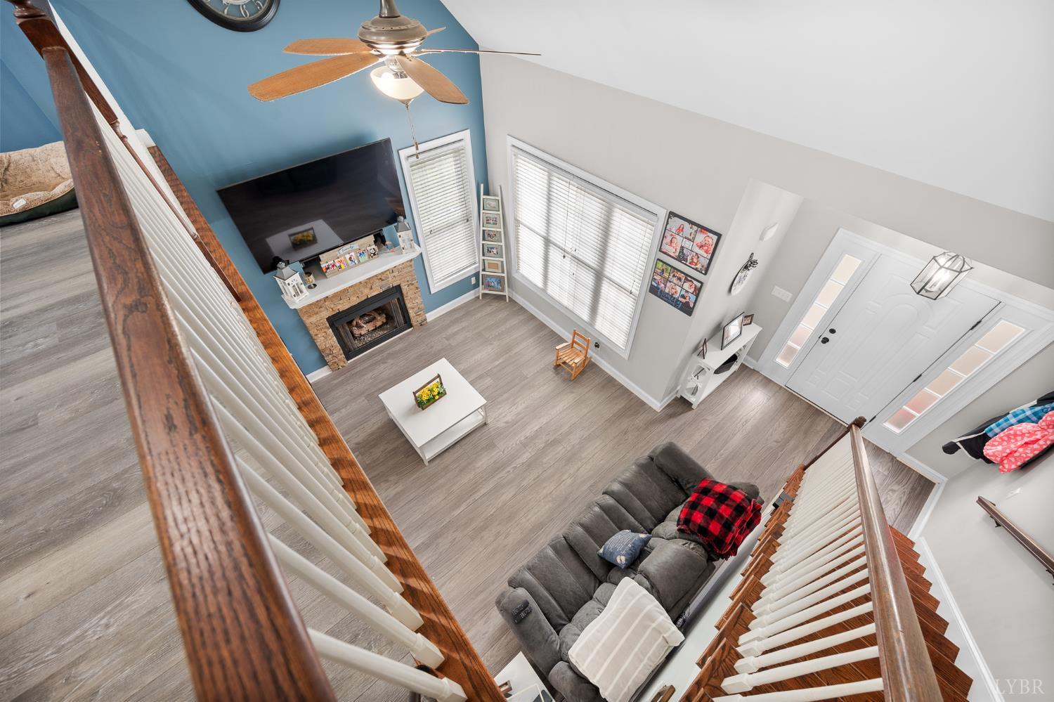 314 Cooper Way Evington, VA 24550 - Photo 26 of 44 a living room with furniture and a flat screen tv
