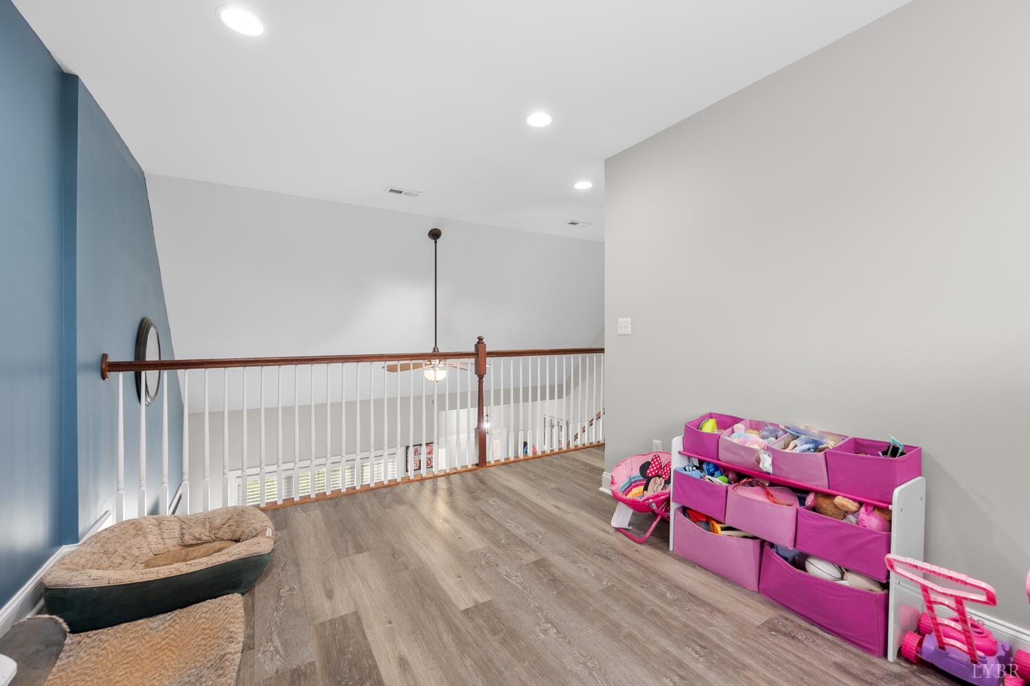 314 Cooper Way Evington, VA 24550 - Photo 29 of 44 a bedroom with furniture and a wooden floor