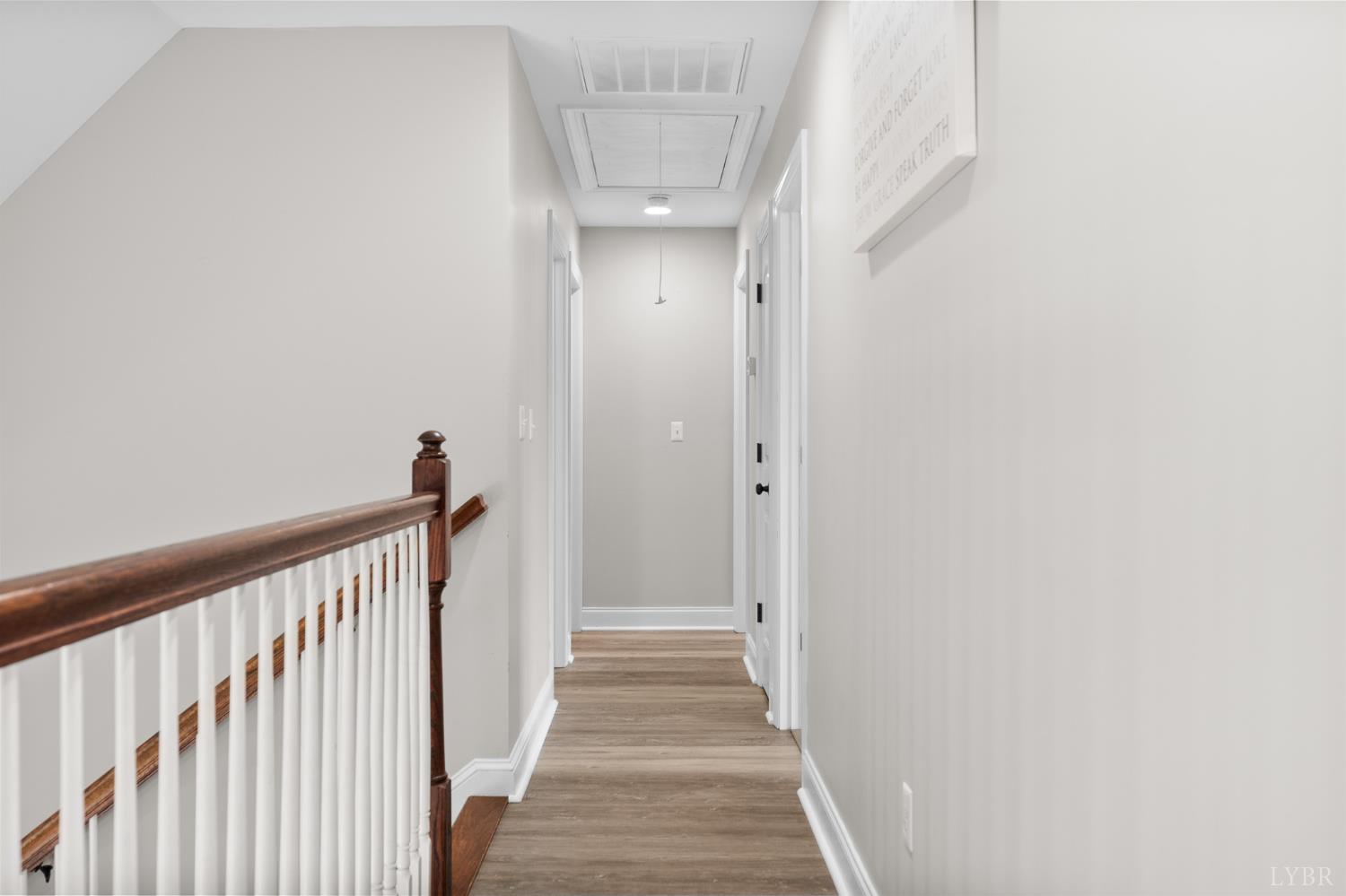 314 Cooper Way Evington, VA 24550 - Photo 30 of 44 a view of a hallway with wooden floor and entryway
