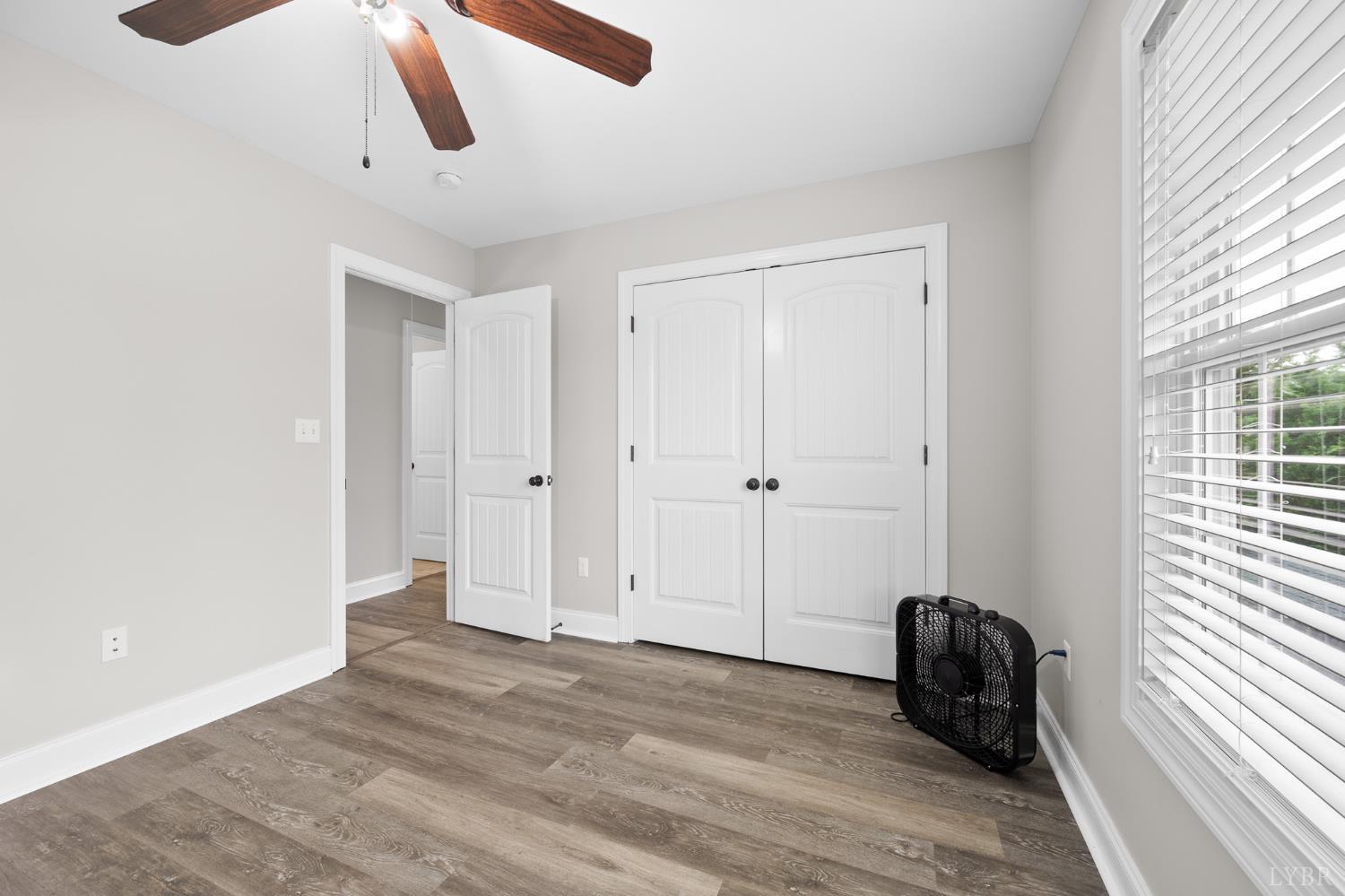314 Cooper Way Evington, VA 24550 - Photo 32 of 44 a view of a closet area with hardwood floor