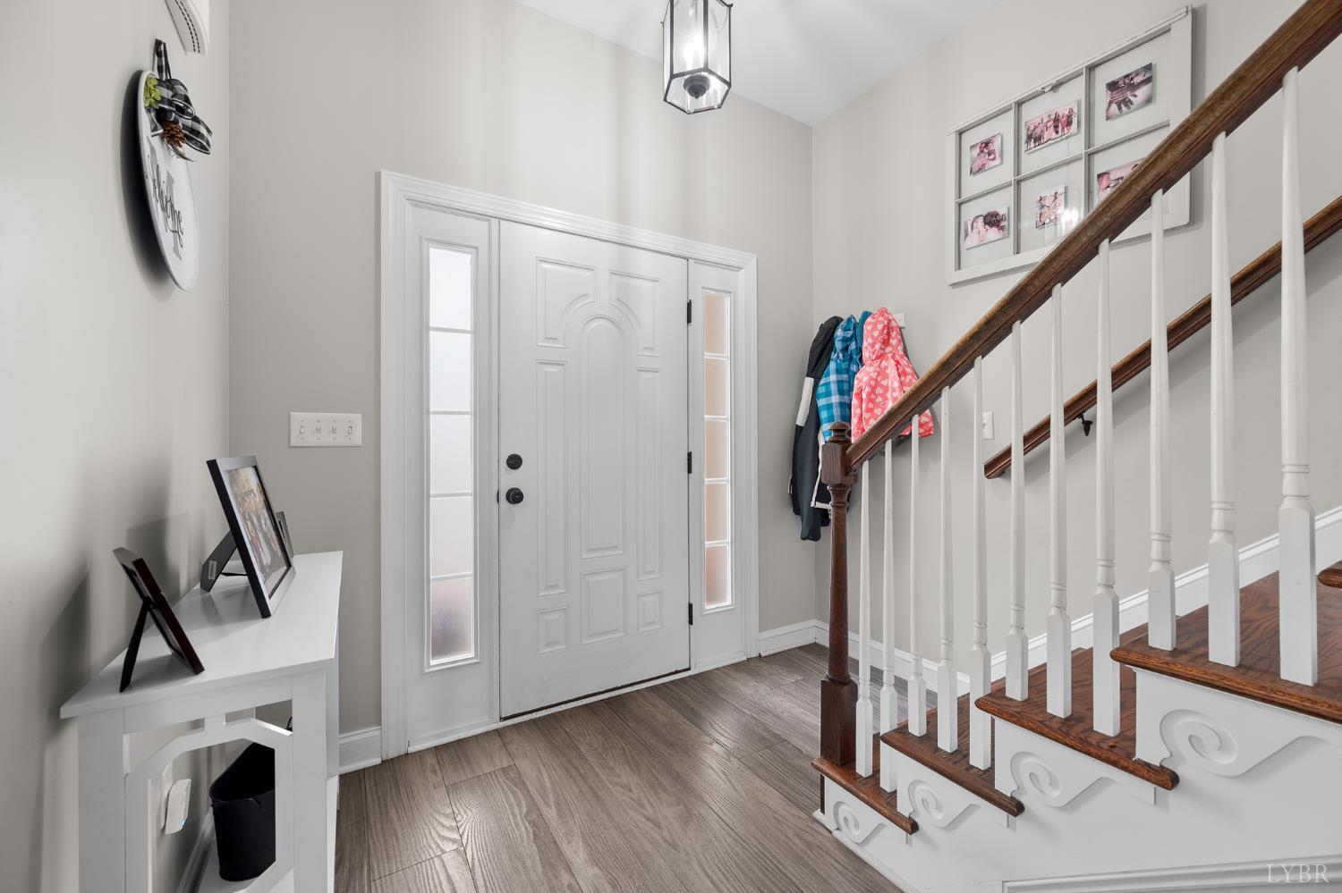 314 Cooper Way Evington, VA 24550 - Photo 7 of 44 a view of an entryway with wooden floor