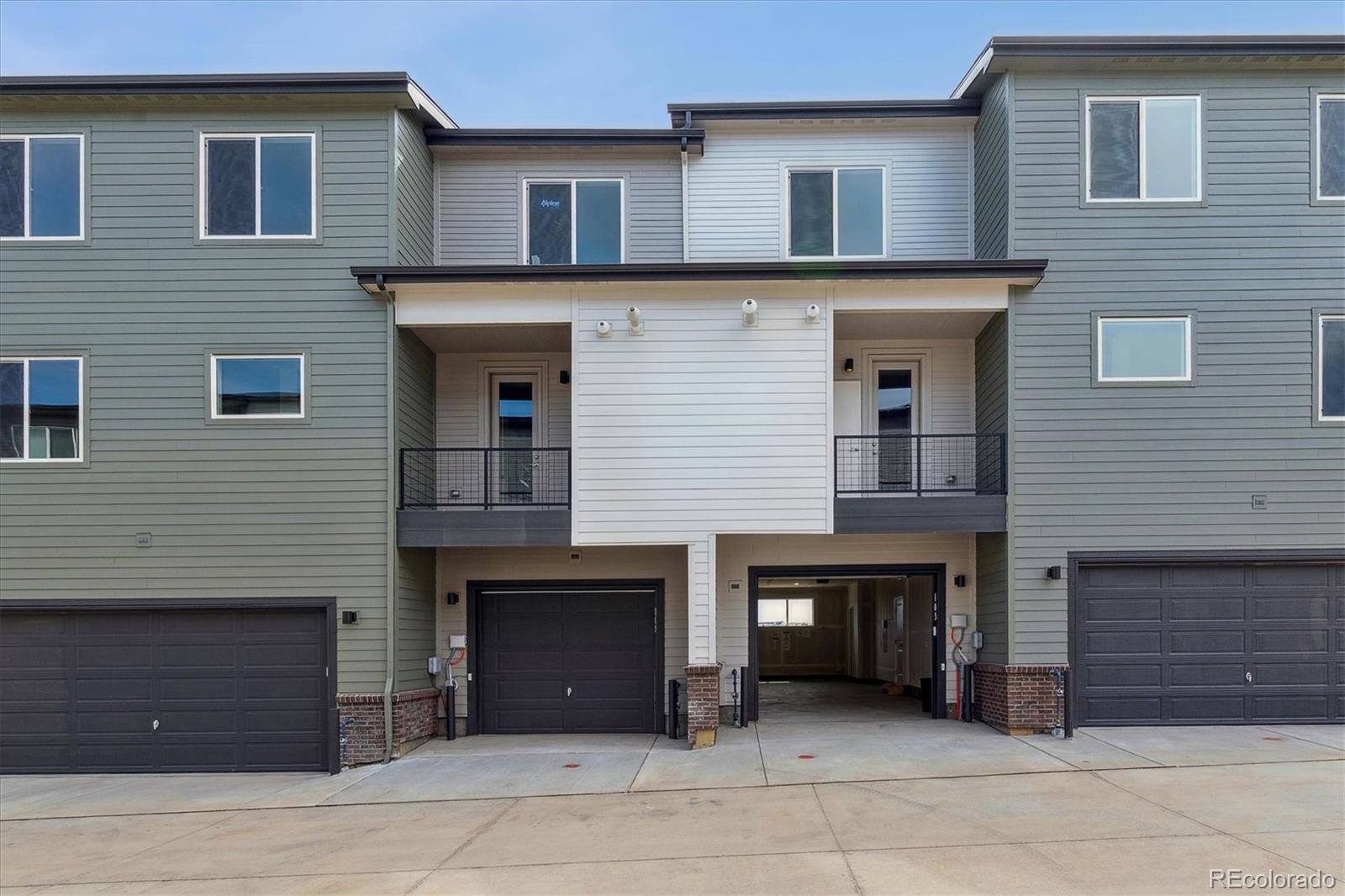 453 Interlocken Boulevard, Unit 103 Broomfield, CO 80021 - Photo 15 of 15 a front view of a house with yard
