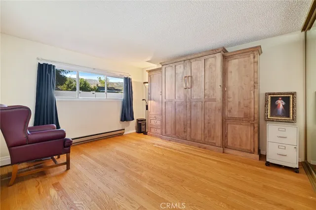 a view of a livingroom with furniture and staircase