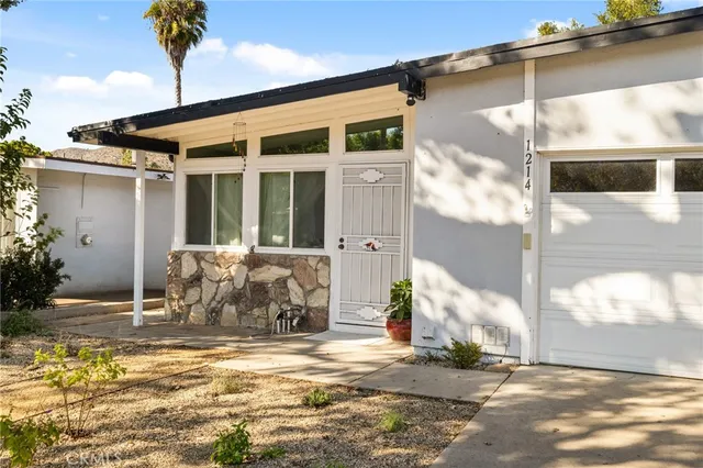 a view of a house with a patio