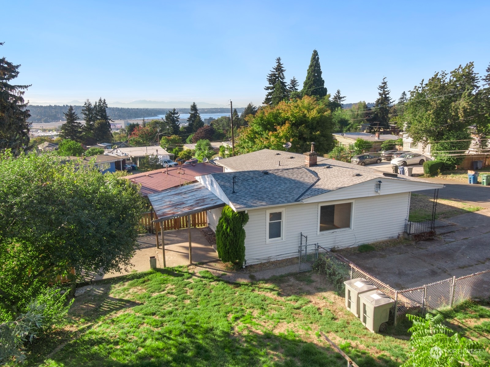 2311 Northeast 6th Place Renton, WA 98056 - Photo 1 of 1 a aerial view of a house with a yard basket ball court and outdoor seating