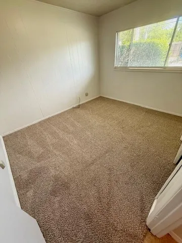 an empty room with a window