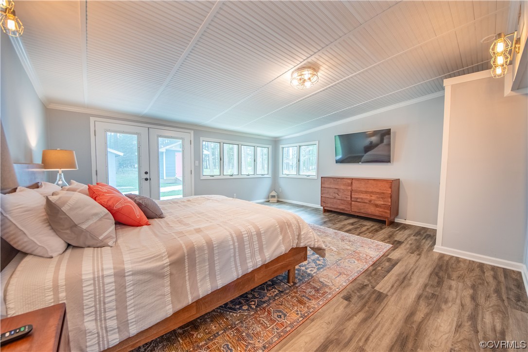 215 Riverside Drive Deltaville, VA 23043 - Photo 16 of 49 a bedroom with bed and window