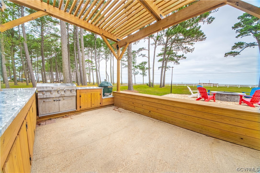 215 Riverside Drive Deltaville, VA 23043 - Photo 32 of 49 a bathroom with a tub sink and view of living room