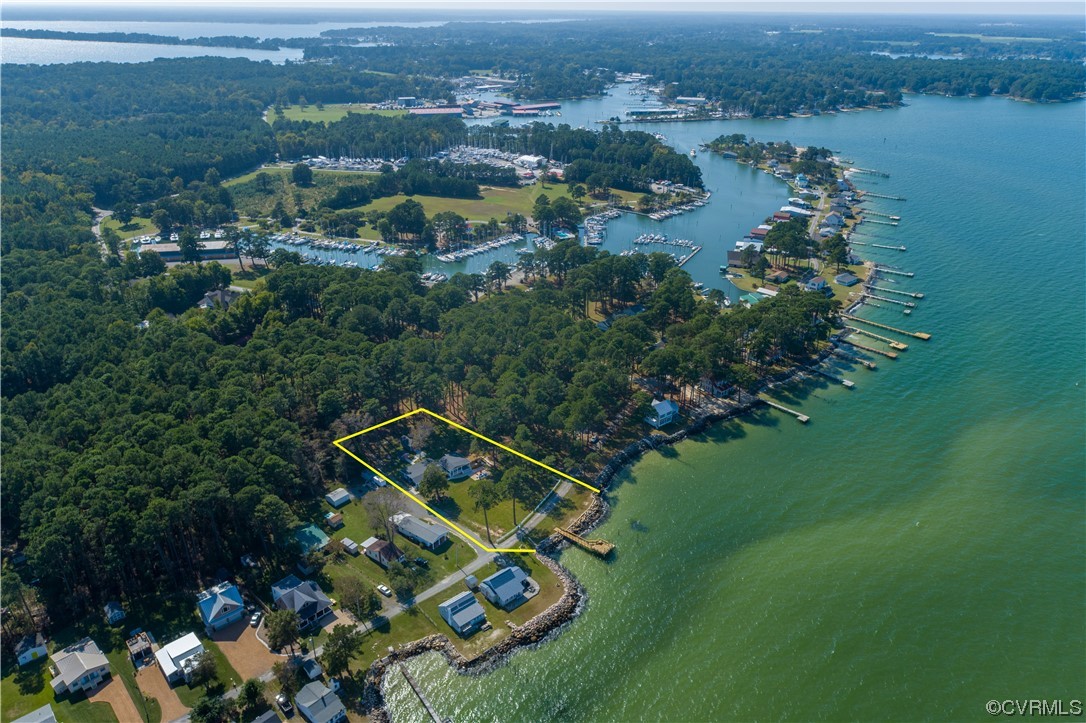 215 Riverside Drive Deltaville, VA 23043 - Photo 40 of 49 an aerial view of a house with a garden and lake view