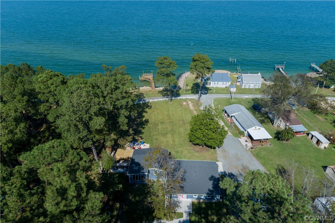 215 Riverside Drive Deltaville, VA 23043 - Photo 46 of 49 a view of a lake with a yard