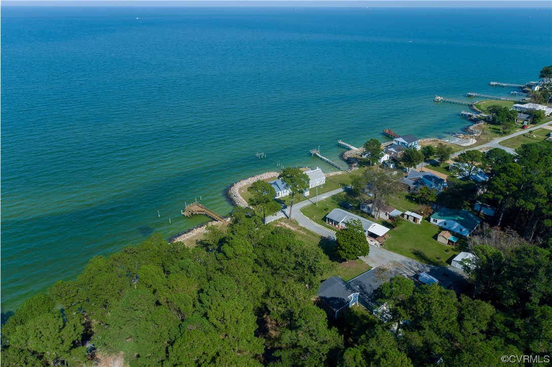 215 Riverside Drive Deltaville, VA 23043 - Photo 47 of 49 a backyard of a house with lots of green space
