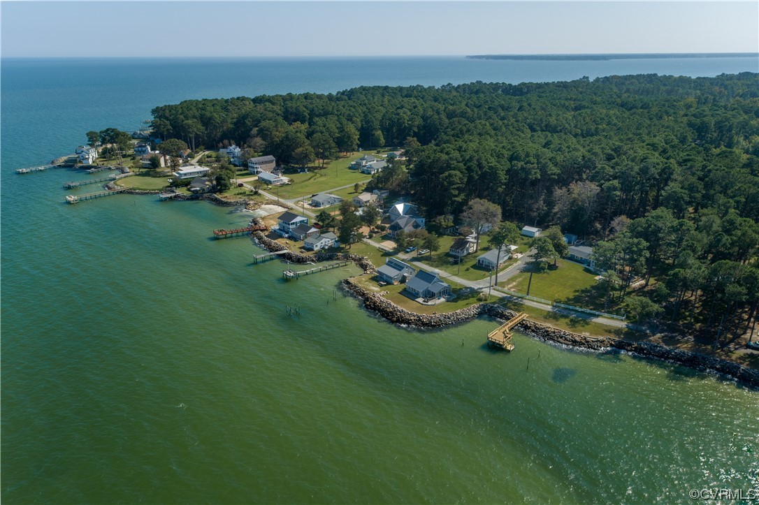 215 Riverside Drive Deltaville, VA 23043 - Photo 49 of 49 a view of a house with a garden and lake view